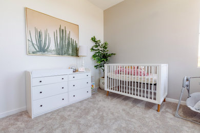 Inspiration for a contemporary nursery remodel in Orange County