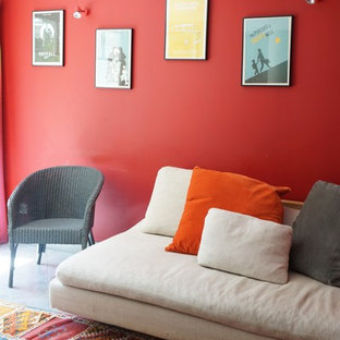 Example of a mid-sized transitional open concept ceramic floor and multicolored floor home theater design in Toulouse with red walls and a wall-mounted tv