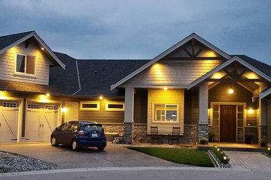 Example of an arts and crafts exterior home design in Vancouver