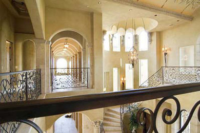 Inspiration for a huge mediterranean tile curved staircase remodel in Sacramento with tile risers