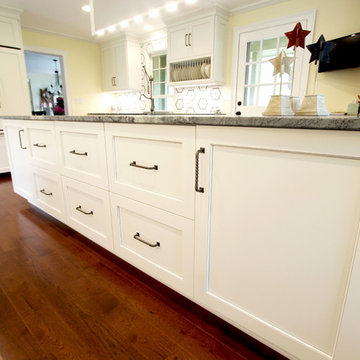 White Cabinets, Grey Countertops and Edgy Tile Backsplash