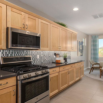 Hickory Cabinets and Metallic Details Kitchen Remodel in Orange, CA