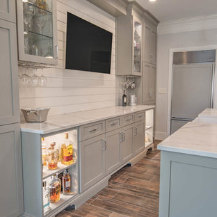 75 Beautiful Farmhouse Home Bar With Solid Surface Countertops