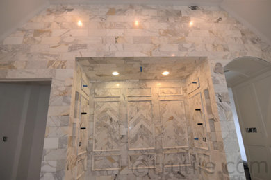 Marble tile marble floor walk-in shower photo in Columbus
