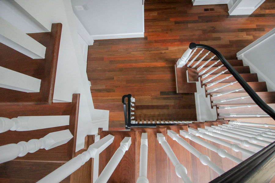 Powerful Impression by Floating Staircase in Suburban Foyer