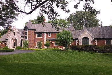 Inspiration for a timeless stone exterior home remodel in Detroit