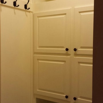 Mudroom with shoe rack, bench, cubbies, cabinets