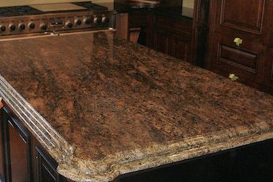 Mid-sized l-shaped enclosed kitchen photo in Phoenix with an island