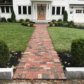 LYNNFIELD BRICK WALKWAY PATH WITH MONOLITHIC GRANITE STEPS TO PORCH
