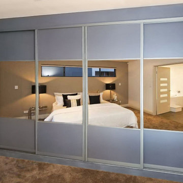 Ample Storage & Reflection with Our Bronze Mirror Sliding Wardrobe in Arlington