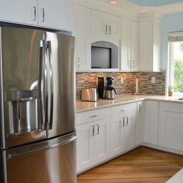 Kitchen Remodel with Maple White Cabinetry, Espresso Island and Tigris Sand Tops