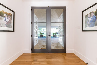 Transitional entryway photo in Dallas