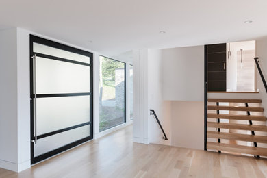 Example of a mid-century modern home design design in Other