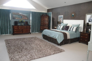 Photo of a transitional home design in Newcastle - Maitland.