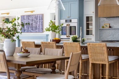 Example of a beach style dining room design in Dallas