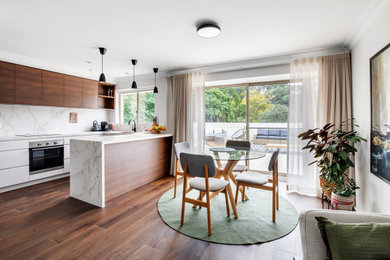 Photo of a midcentury dining room in Sydney.