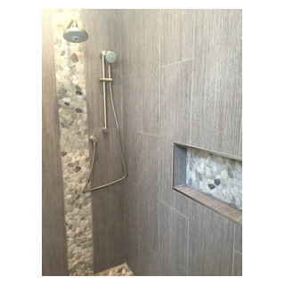 Pebble tile recessed niche with 12