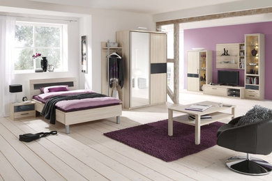 This is an example of a mid-sized contemporary bedroom in Other.