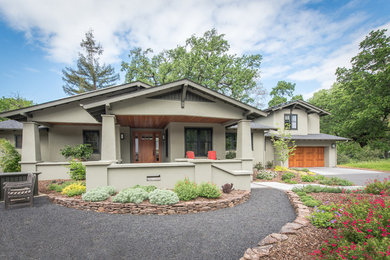 Example of a beige exterior home design in Other