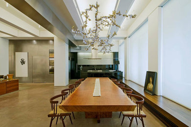Design ideas for an industrial open plan dining in New York.