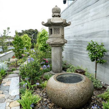 Old Japanese stone lantern and water basin
