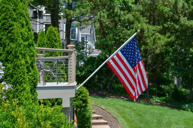 Deck - large modern side yard deck idea in Boston