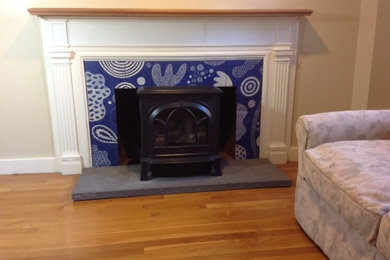 Carved Ceramic Tiled Fireplace-Swimming Shapes