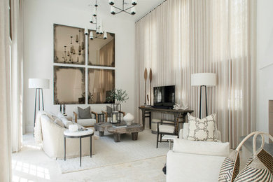Inspiration for a large coastal enclosed beige floor living room remodel with white walls, no tv and a corner fireplace