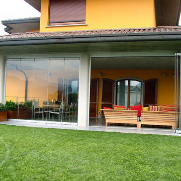 Patio closed off with folding glass doors, water and airproof