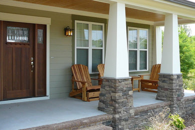 Large craftsman beige two-story mixed siding gable roof idea in Nashville