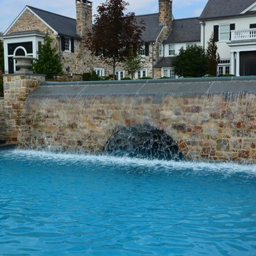 Infinity edge pool with underground grotto
