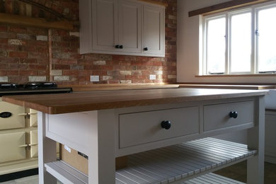 This is an example of a country kitchen in Other.