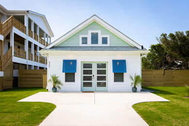 Example of a transitional exterior home design in Other