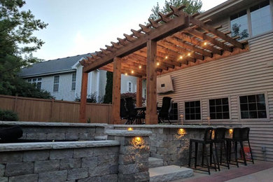 Example of a classic patio design in Other