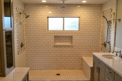 Example of a large transitional master white tile and ceramic tile ceramic tile and white floor double shower design in Orange County with flat-panel cabinets, gray cabinets, a one-piece toilet, gray walls, a wall-mount sink, quartzite countertops and yellow countertops