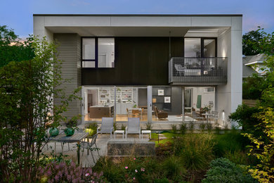 Inspiration for a contemporary two-story house exterior remodel in Chicago