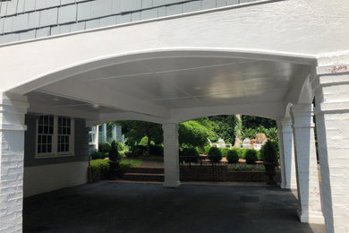 Large elegant white two-story house exterior photo