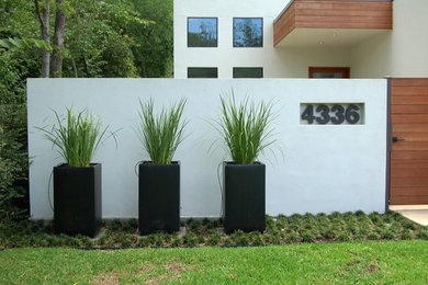 Example of a minimalist exterior home design in Dallas
