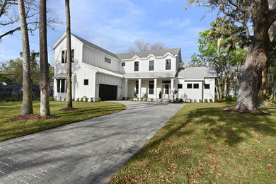 Example of a farmhouse exterior home design in Jacksonville
