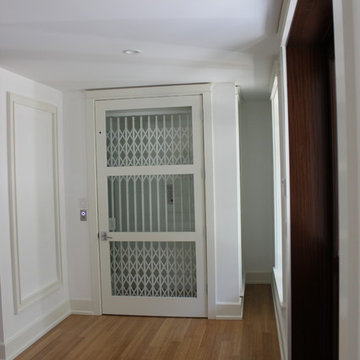 Custom Glassed-In Elevator Shaft, Elevator Car, Trim Work & Ballustrade