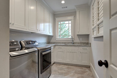 Arts and crafts laundry room photo in Atlanta