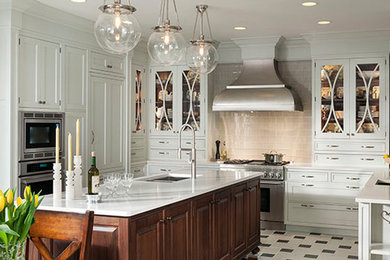 Large transitional u-shaped porcelain tile and multicolored floor eat-in kitchen photo in Chicago with a drop-in sink, beaded inset cabinets, white cabinets, quartzite countertops, beige backsplash, mosaic tile backsplash, stainless steel appliances, an island and white countertops