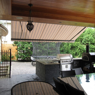 Retractable awning over outdoor kitchen