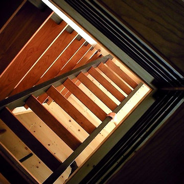 Cherry and steel stairs and bookcase