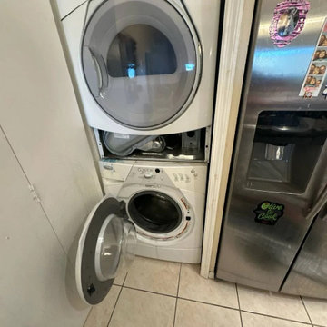 Berne technician servicing a dryer