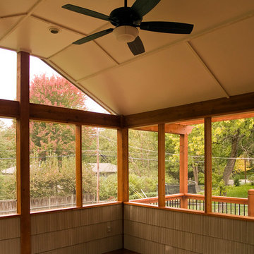 Lamping - Cedar deck in Kansas City with screened in porch.