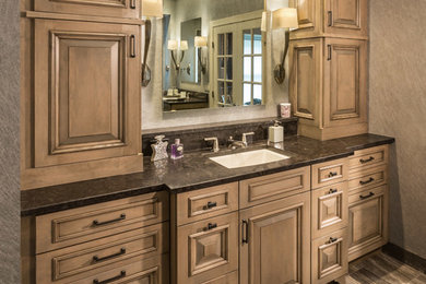 Large transitional master marble floor and multicolored floor bathroom photo in Chicago with an undermount sink, furniture-like cabinets, medium tone wood cabinets, granite countertops and brown walls