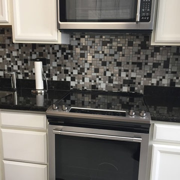 Eden Mosaic Tile Installations: Cobble Stainless Steel With White Glass Tile