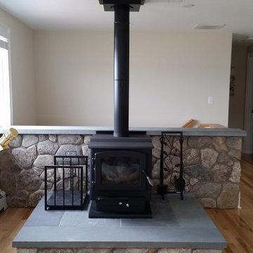 Stove and Stone Hearth in Living Room