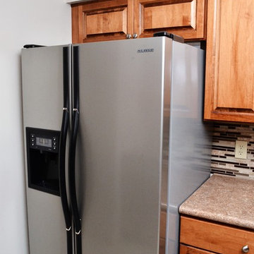 Monticello, IN. Haas Lifestyle Collection, Pecan Maple Kitchen